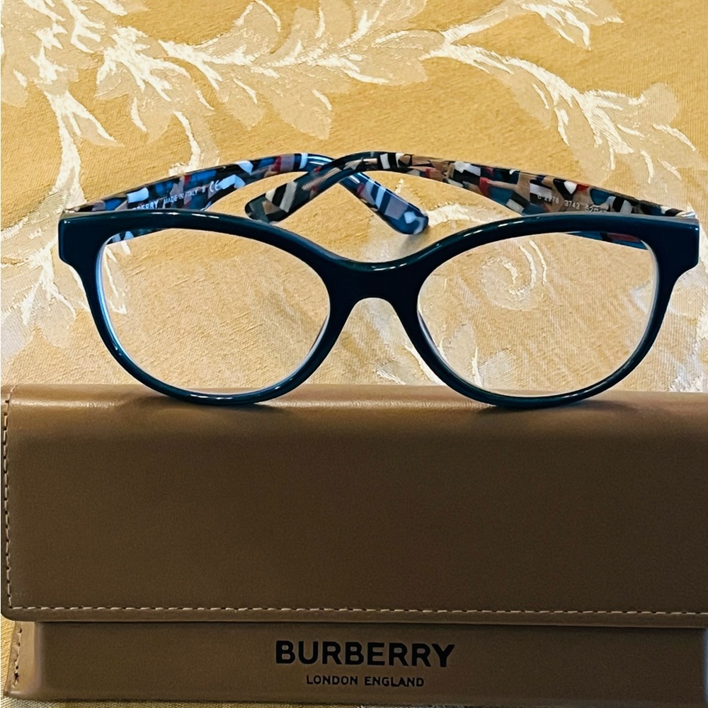 Burberry Women's Teal glasses with Plaid Pattern inside of temples.